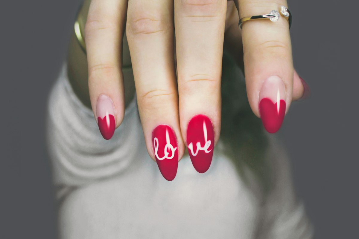 Editorial manicure detail showing high-gloss finish