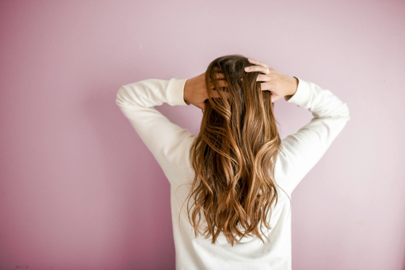 Soft waved hair with warm balayage highlights